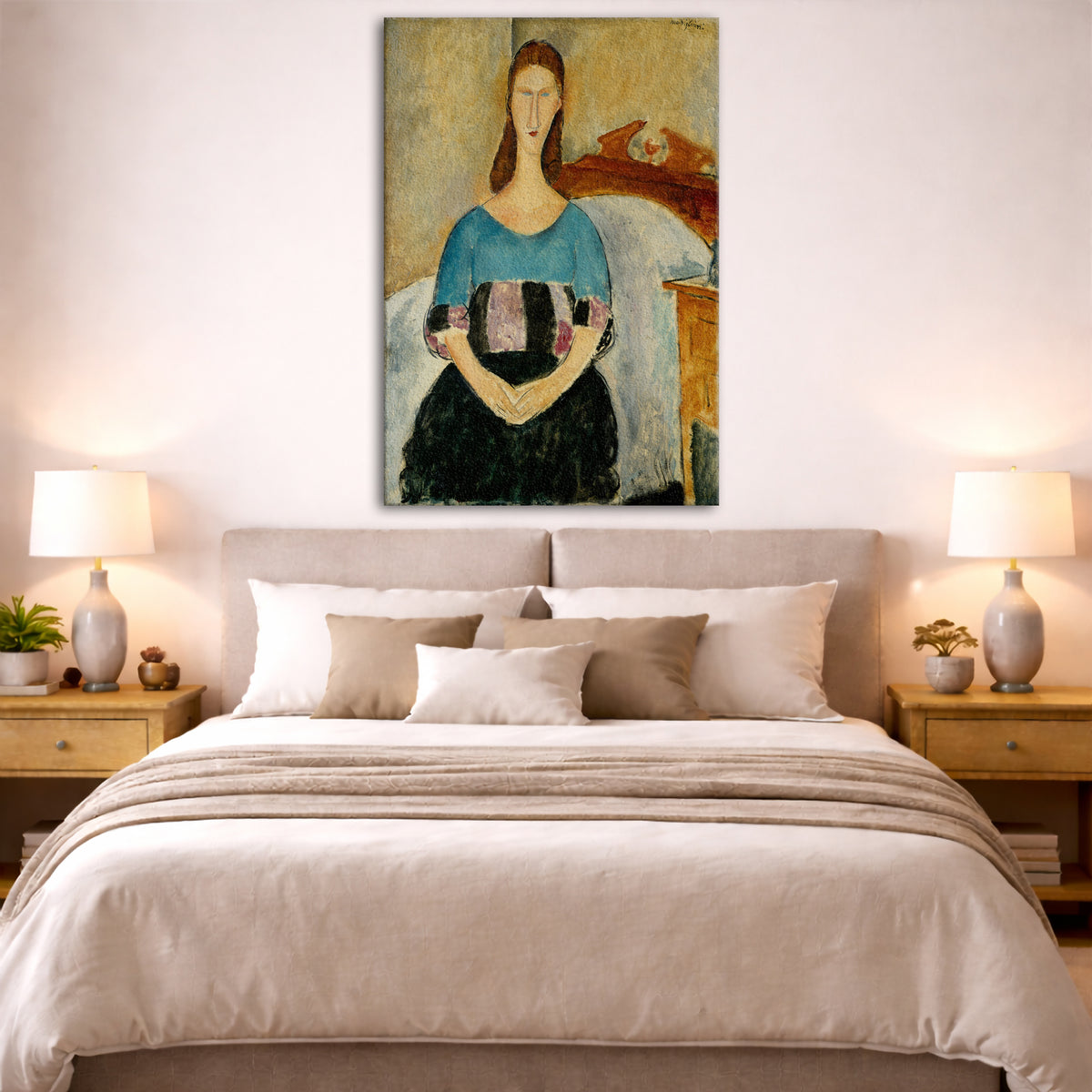 Amedeo Modigliani - Jeanne Hebuterne Seated Giclée canvas print displayed above a bed in a bedroom interior
